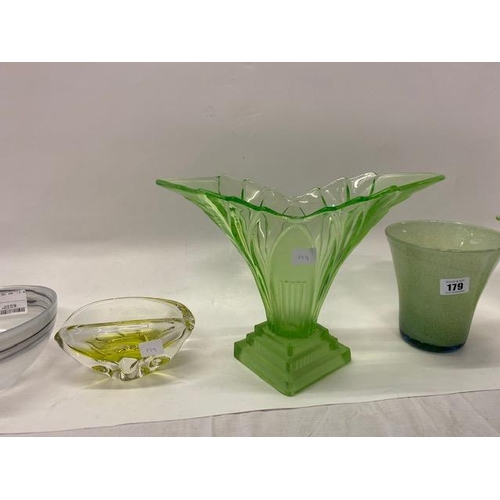 179 - A Monart style vase in green, a yellow and clear vase, two Art Deco uranium style vases, a large cyl... 