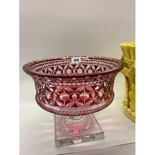 180 - A Waterford Crystal ruby flashed bowl, in fitted box, a ruby flashed pedestal bowl on heavy square b... 