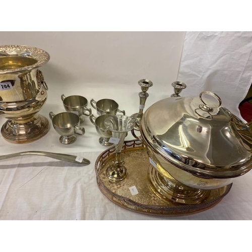 204 - A selection of silver plate including a wine cooler, pair of candlesticks, soup tureen and cover, ov... 