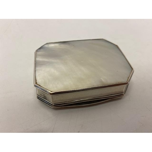 232 - A rectangular trinket box with canted corners, the lid inset mother of pearl carved to classical lad... 