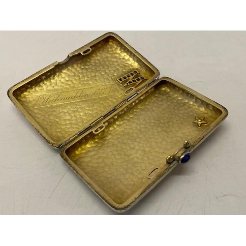 243 - A Continental hammered silver cigarette case, the front with initial M set in sapphires, the reverse... 