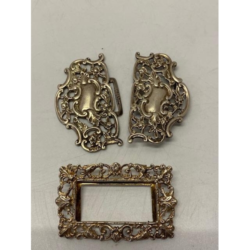 245 - A silver nurse's buckle with pierced leaf scroll decoration - Birmingham 1902, makers marks for E S ... 