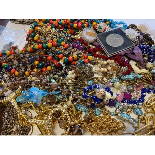 249 - A selection of costume jewellery including bead necklaces etc..