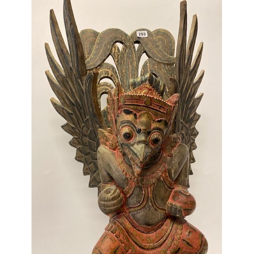 295 - A large Indian carved wood and painted figure