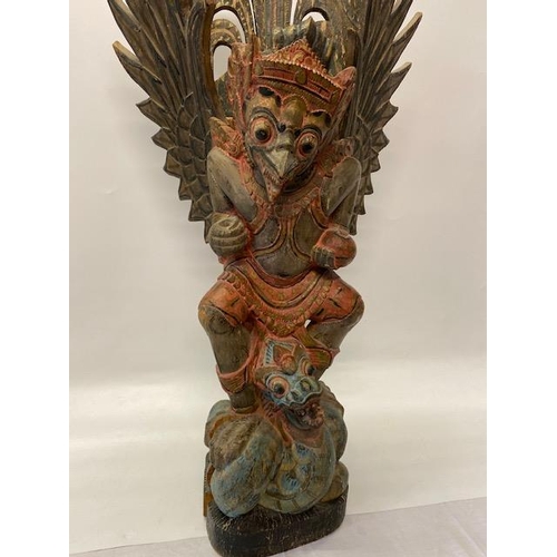 295 - A large Indian carved wood and painted figure