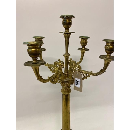 301 - A pair of brass five light candelabra with acanthus leaf columns, on square bases - 26in. high overa... 