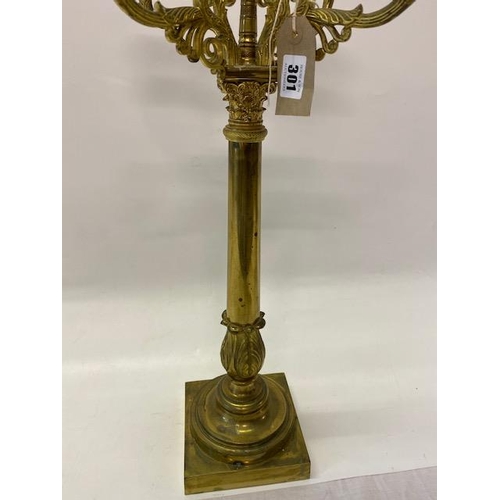 301 - A pair of brass five light candelabra with acanthus leaf columns, on square bases - 26in. high overa... 