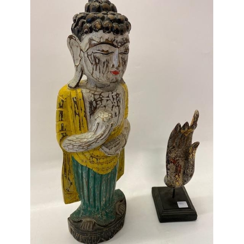 304 - A painted carved wood figure of a Buddha - 20 1/2in. high and an Indian painted wood hand on square ... 