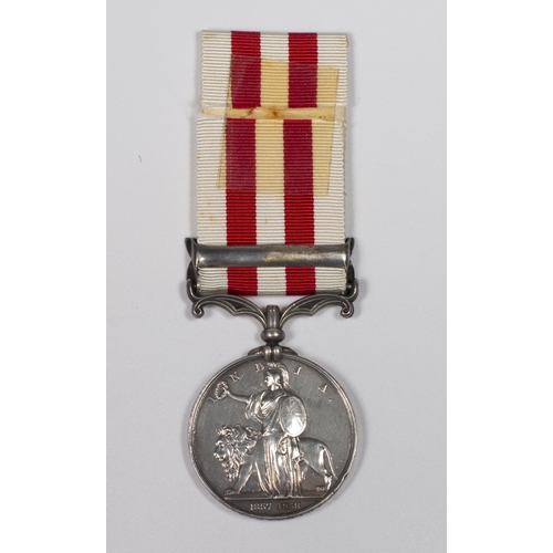 314 - An Indian Mutiny medal with Lucknow bar awarded to R Adamson 38th Reg