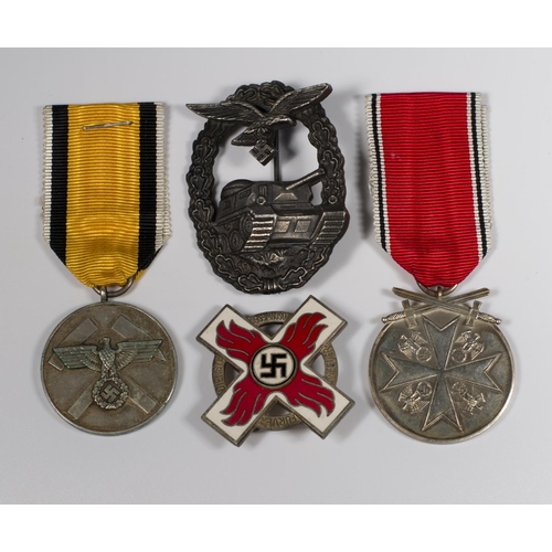 339 - Four replica German Second World War medals and badges