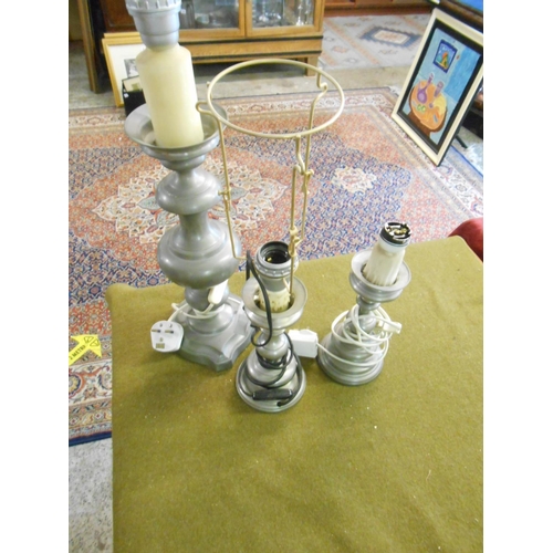 79 - A pair of turned walnut tablelamps, a turned wood tablelamp base, a tablelamp base with fluted colum... 