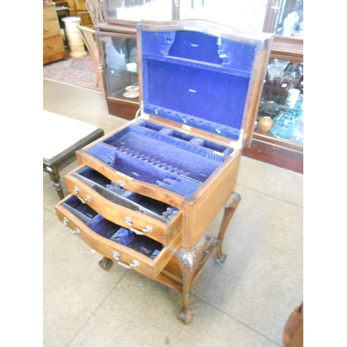 97 - A walnut canteen table with hinged lid, two drawers with serpentine fronts, on cabriole legs - 22in.... 