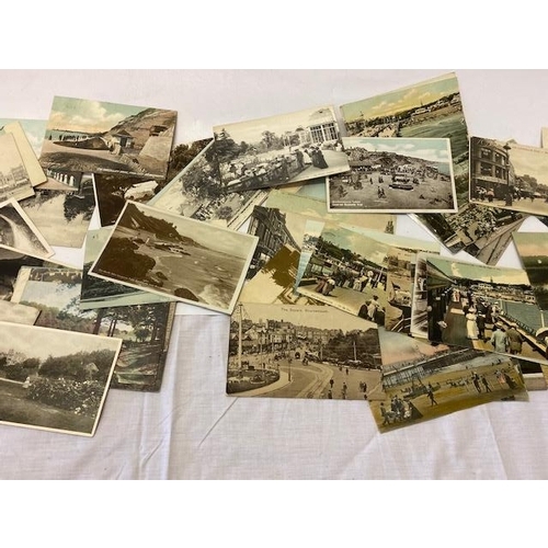 46 - A collection of black and white and coloured postcards depicting views of the local area including B... 