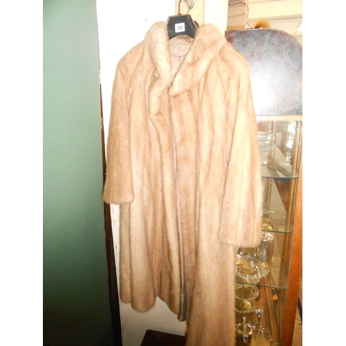 112 - A lady's full length pastel mink coat