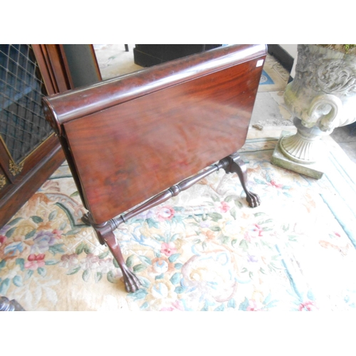 63 - A Victorian mahogany Sutherland table with roll top, two deep drop flaps, on turned legs and feet - ... 