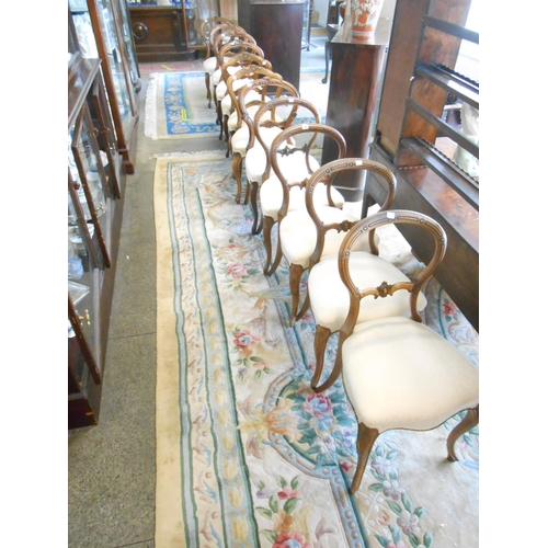 70 - A set of five Victorian mahogany framed dining chairs with balloon shaped backs, carved centre splat... 