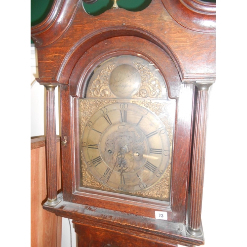 73 - An 18th Century longcase clock with brass dial, pierced brass spandrels, in an oak case with broken ... 