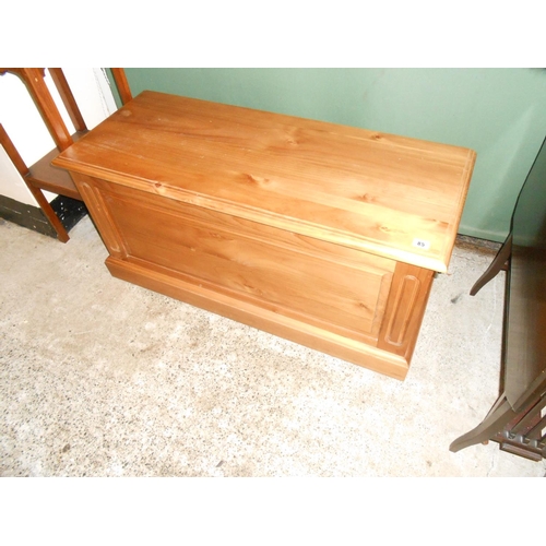 85 - A modern pine blanket box - 39in. wide, a modern pine bedside cabinet fitted drawer and recess under... 