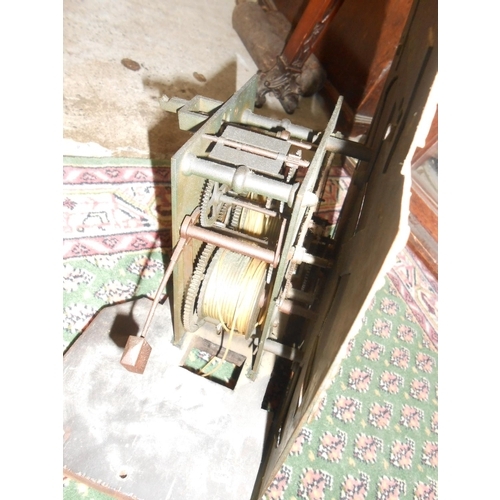 73 - An 18th Century longcase clock with brass dial, pierced brass spandrels, in an oak case with broken ... 
