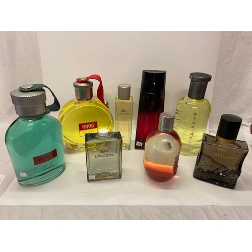 132 - Five large advertising scent bottles for Hugo Boss including Boss Woman and Elements and three large... 