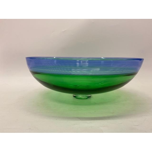 134 - A large Scandinavian green Art Glass bowl with blue rim, signed - 14 1/2in. dia.