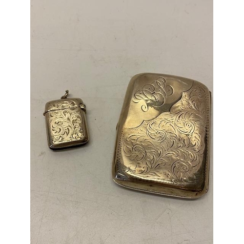 138 - A silver vesta case with engraved decoration and a silver cigarette case