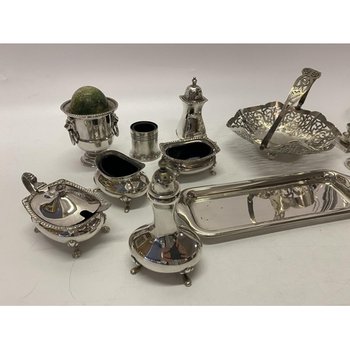 181 - A small selection of silver plated items including cruet