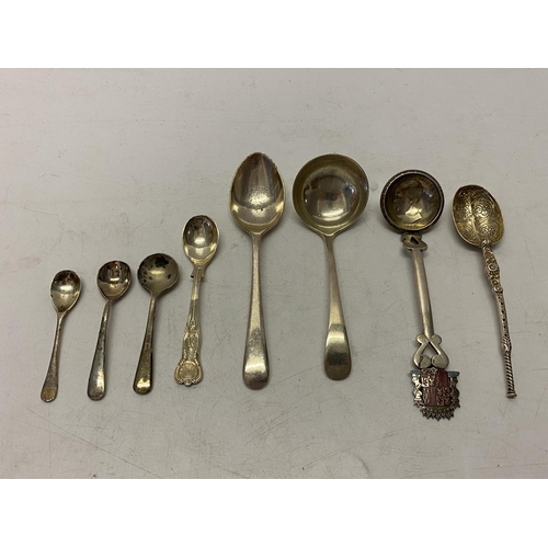 189 - A small silver sauce ladle, four silver cruet spoons and three other silver spoons