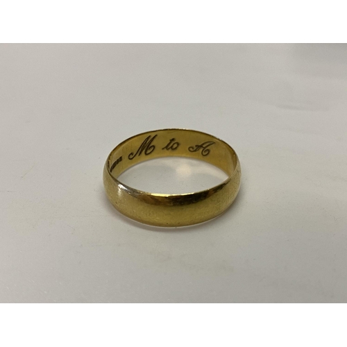 204 - An 18ct. gold wedding ring