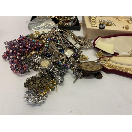 216 - A selection of costume jewellery including brooches, necklaces, dress watches etc..