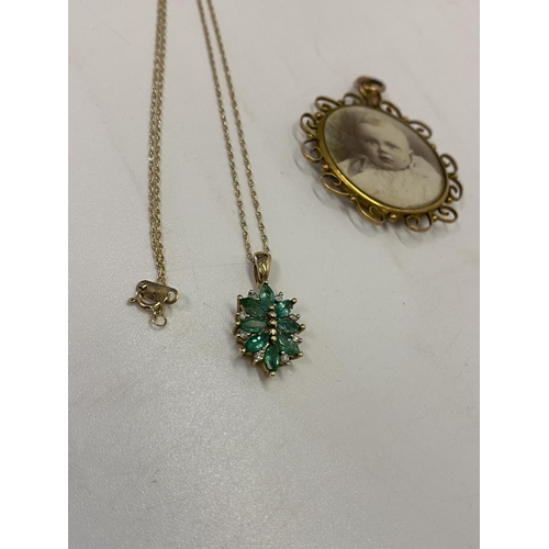 221 - A 9ct. gold pendant set emeralds and diamonds to flower form, on a fine 9kt. gold chain and a 9ct. g... 