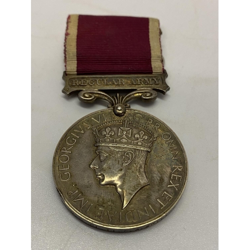 256 - A George VI Army Long Service and Good Conduct medal with Regular Army bar awarded to S-6405 W.O.CL.... 