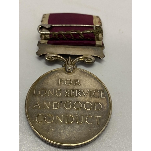 256 - A George VI Army Long Service and Good Conduct medal with Regular Army bar awarded to S-6405 W.O.CL.... 