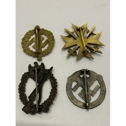 259 - Four German Second World War style badges