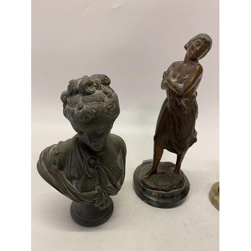 264 - A bronze study of a lady with her arms folded, on circular black marble base - 11in. high, head and ... 