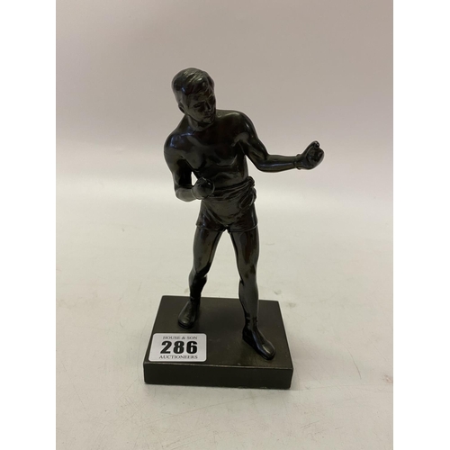 286 - A bronze study of a classical fighter, on black square marble base - 6 1/2in. high