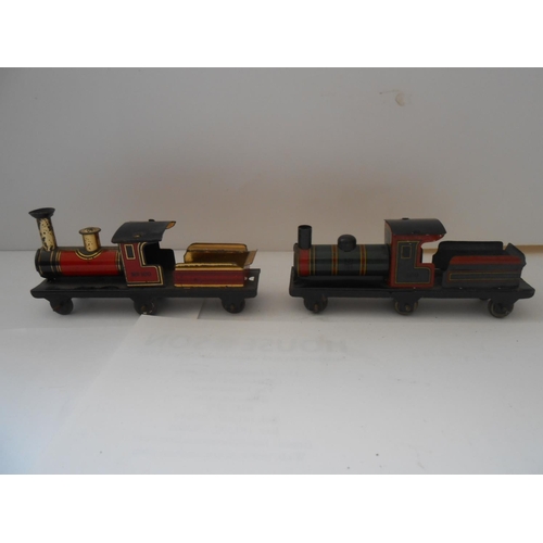 365 - Two Japanese small tin plate clockwork railway engines and ten items of rolling stock and a miniatur... 