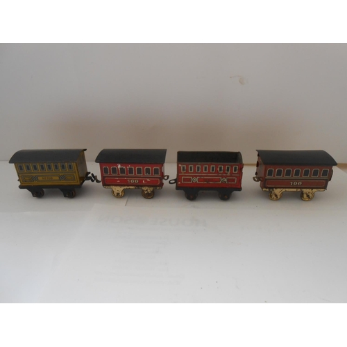 365 - Two Japanese small tin plate clockwork railway engines and ten items of rolling stock and a miniatur... 