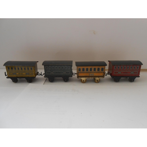 365 - Two Japanese small tin plate clockwork railway engines and ten items of rolling stock and a miniatur... 