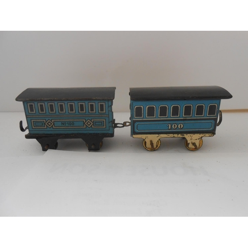 365 - Two Japanese small tin plate clockwork railway engines and ten items of rolling stock and a miniatur... 