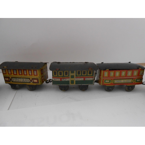 365 - Two Japanese small tin plate clockwork railway engines and ten items of rolling stock and a miniatur... 