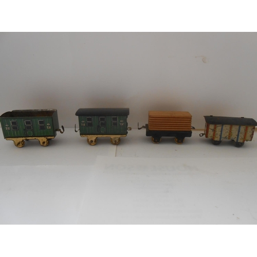 366 - Fifteen items of tin plate rolling stock and a clockwork engine