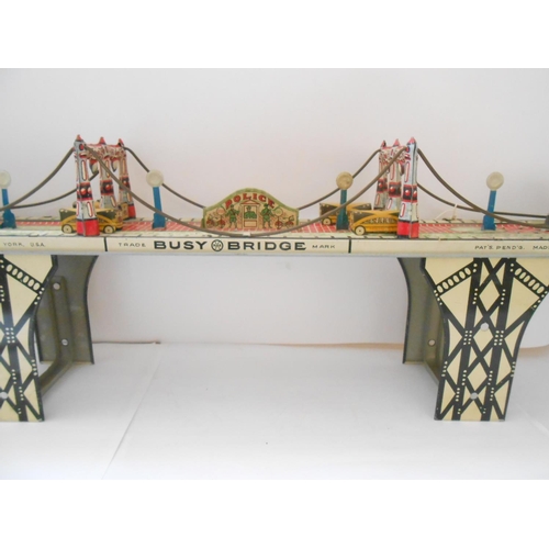 371 - A Louis Marx and Co. clockwork Busy Bridge - 24in. long