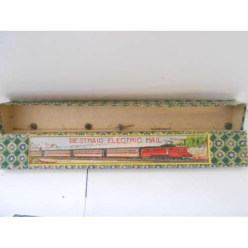 377 - A tin plate clockwork Magic Railway, boxed and a Bestmaid Electric Railway, boxed