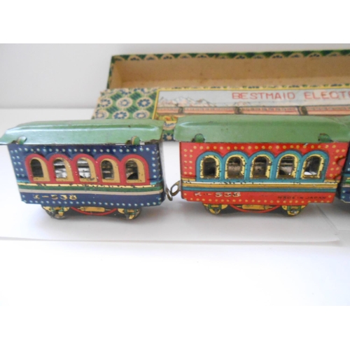 377 - A tin plate clockwork Magic Railway, boxed and a Bestmaid Electric Railway, boxed