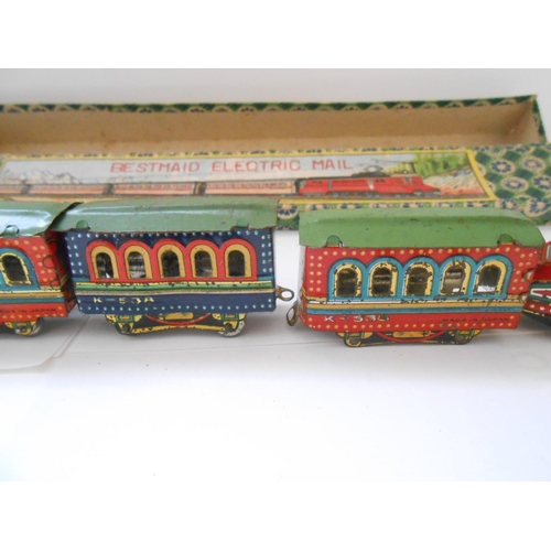 377 - A tin plate clockwork Magic Railway, boxed and a Bestmaid Electric Railway, boxed