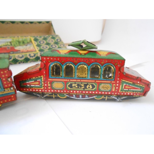 377 - A tin plate clockwork Magic Railway, boxed and a Bestmaid Electric Railway, boxed