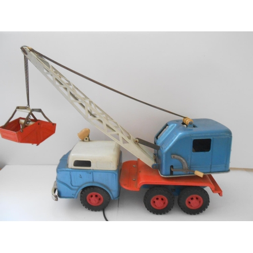 381 - A Gama battery operated remote control model of a crane excavator truck - 14in. wide and 11in. high