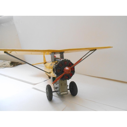 382 - A Straco battery operated model of a Bristol Bulldog T360 airplane - 12in. long and 5in. high