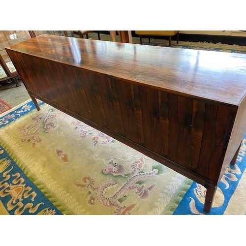 98 - A Danish rosewood dining room suite comprising:- Skovby  Furniture Factory dining table with two ext... 